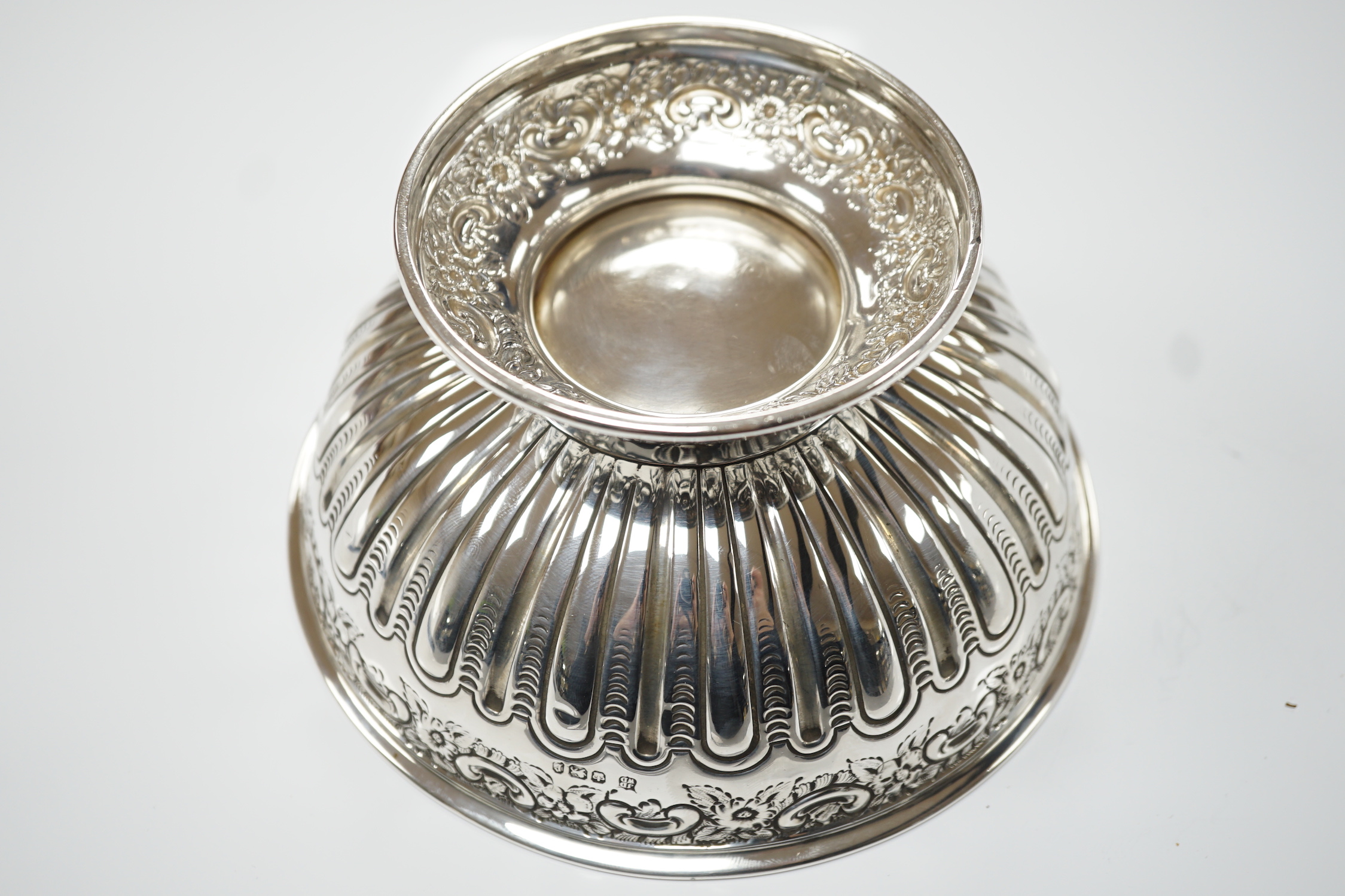 A late Victorian repousse silver small rose bowl, James Deakin & Sons, Sheffield, 1897, diameter 16.6cm, 7oz.